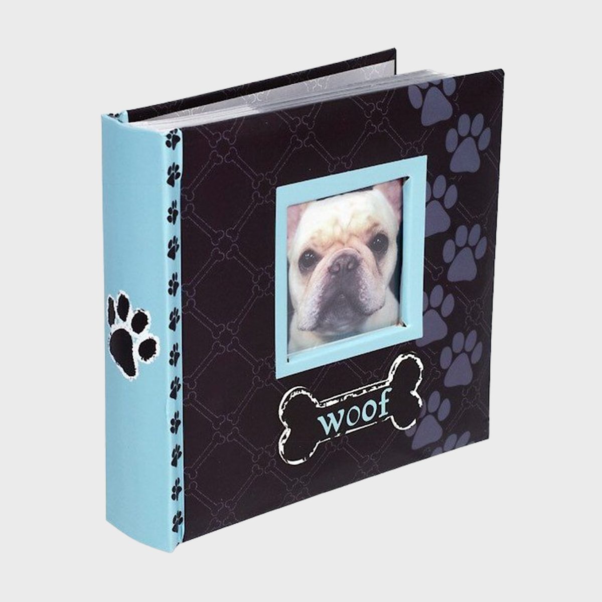 Photo album displays a dog's face; cover features paw prints and the word "woof" within a bone shape, set in a patterned backdrop.
