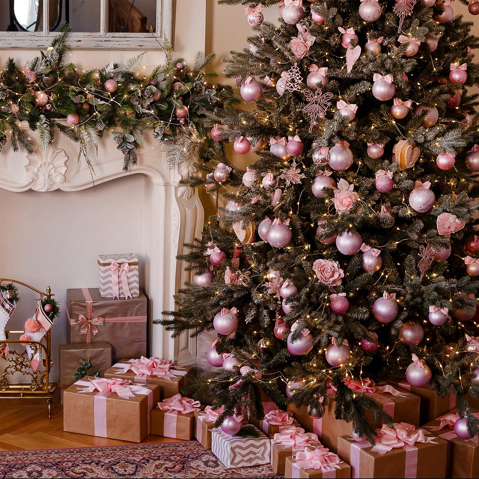 Christmas socks hanging on the mantelpiece. elegant Christmas tree