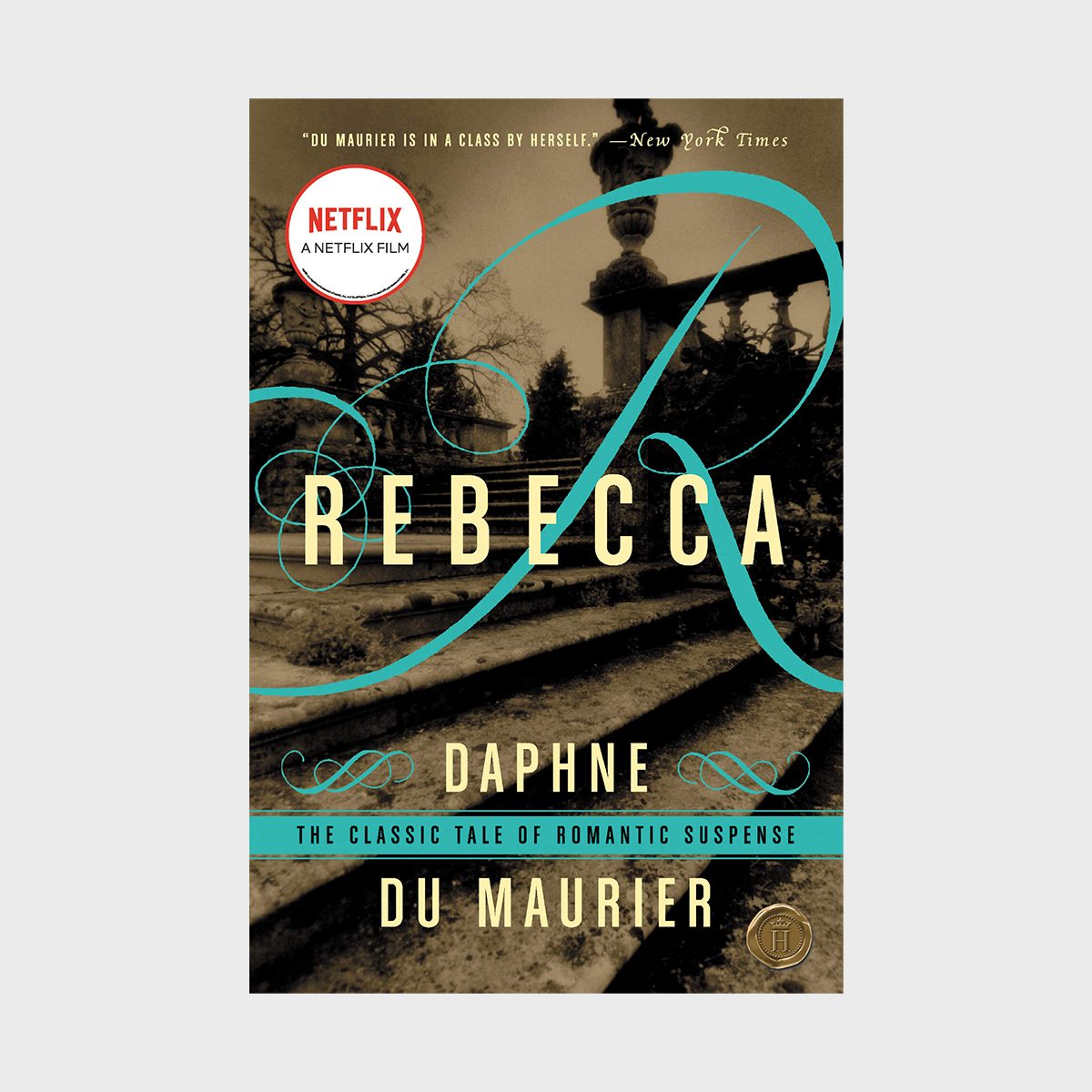 Book cover features large text "REBECCA," swirling design; sepia-toned stone steps with balustrade; "DAPHNE DU MAURIER." Emphasis: dramatic, vintage mystery ambiance.