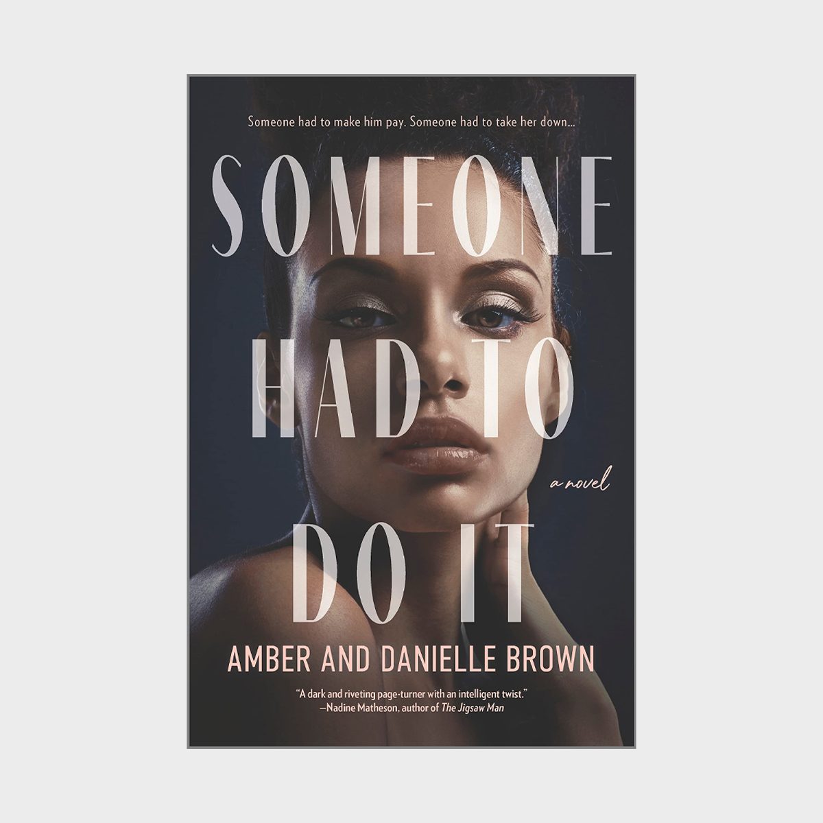 Face of a woman, large text overlay: "Someone Had To Do It." Background dark, suggesting mystery or suspense. Text: Amber and Danielle Brown.