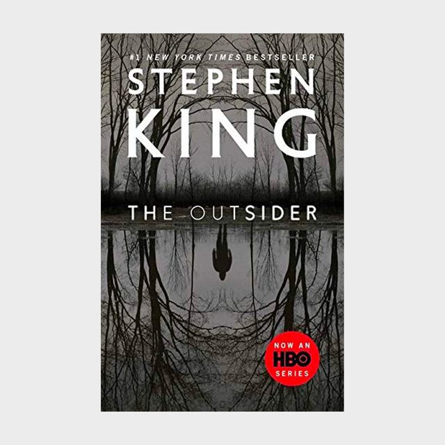 Book cover shows a person's reflection in water surrounded by leafless trees. Text reads: 
