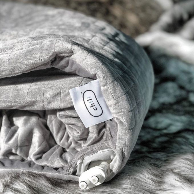 A gray, folded blanket with a 