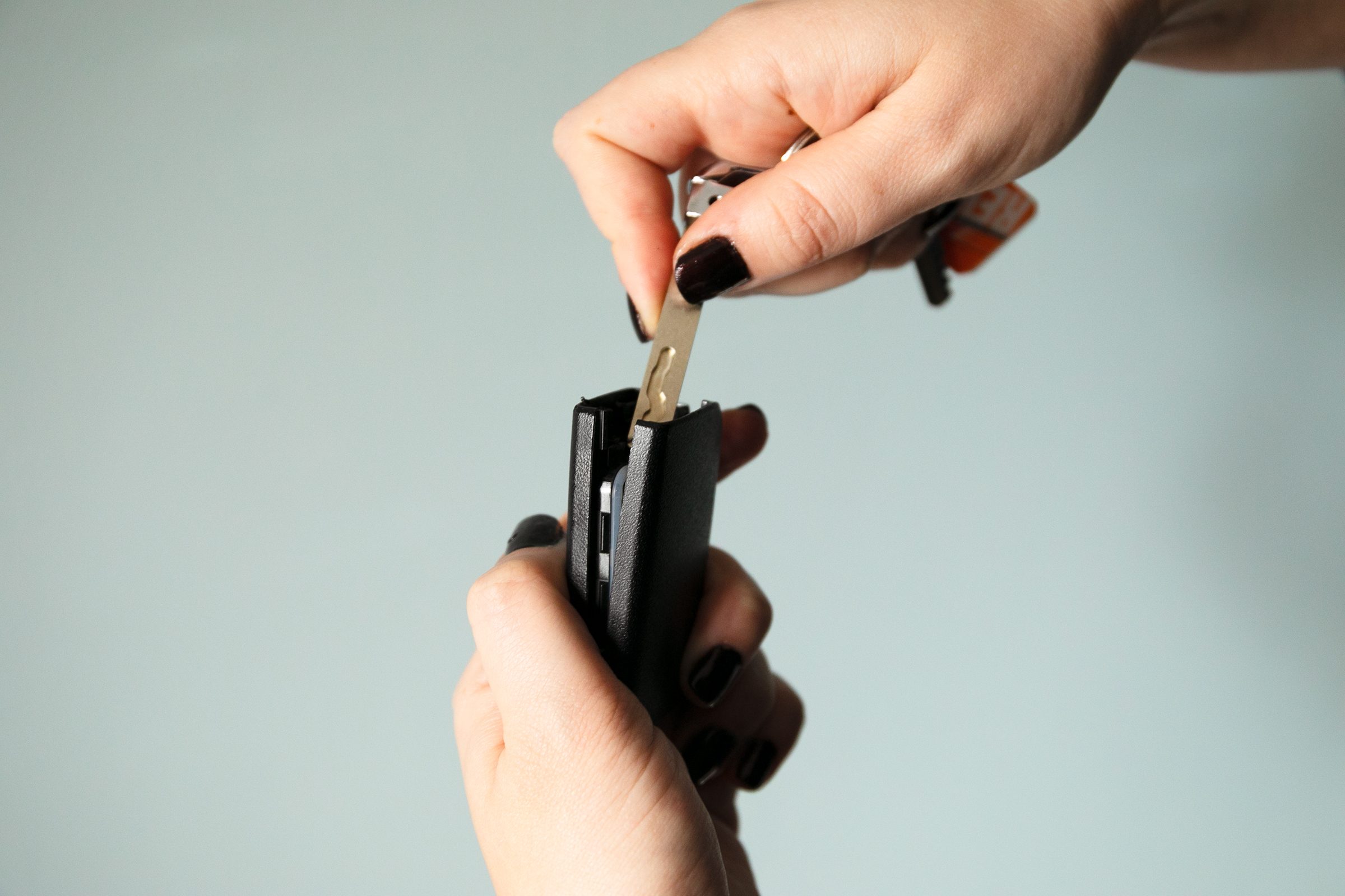 prying open a car key fob