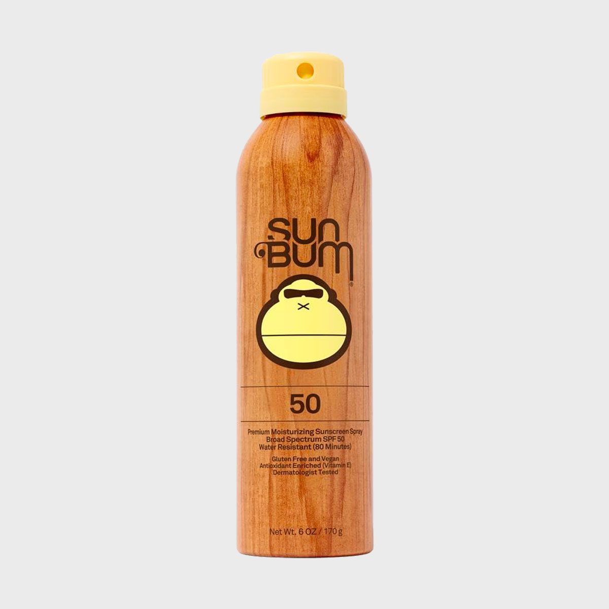 Sunscreen spray can, standing upright, with wood-like design and yellow cap, labeled "Sun Bum" SPF 50, surrounded by a light gray background.