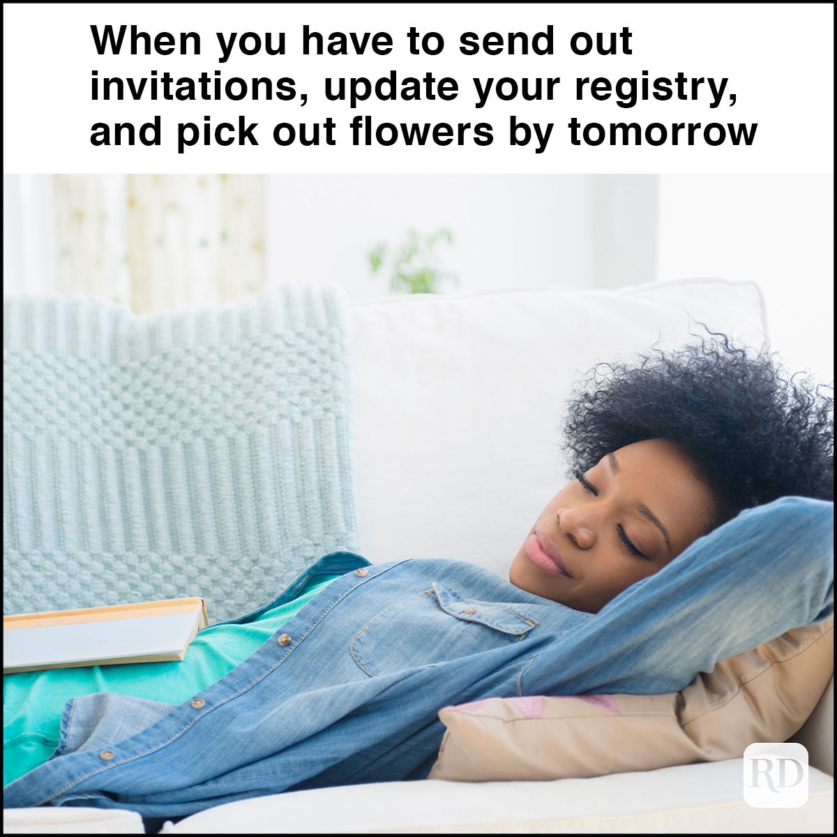 African American woman napping on sofa