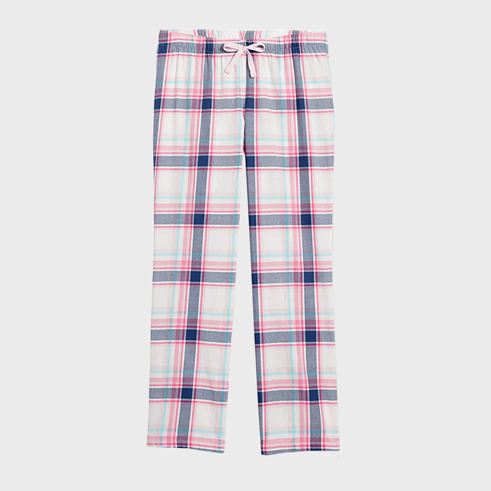 Pajama pants lie flat displaying a pastel plaid pattern with pink, blue, and white stripes on a plain white background.