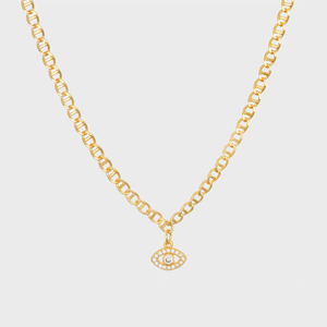 Gold chain necklace displays a small, eye-shaped pendant surrounded by rhinestones, set against a plain white background.