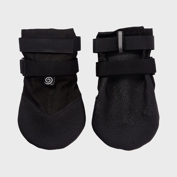 Black dog boots lying flat, secured with Velcro straps, displayed against a plain white background.