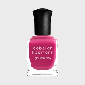 Pink nail polish bottle labeled 