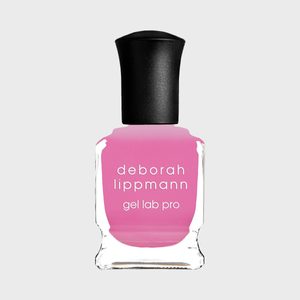 A pink nail polish bottle, labeled 