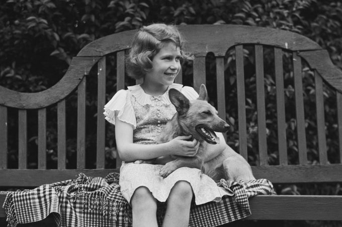 young queen elizabeth with her corgi