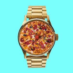 A watch displays a pizza where the dial should be, set against a solid turquoise background.