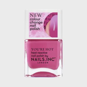Nail polish bottle displays pink color, promises heat-reactive color change. Text on label reads 