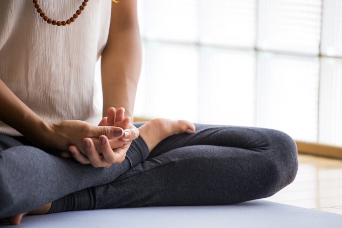 Young,latin,woman,practicing,meditation,indoors.
