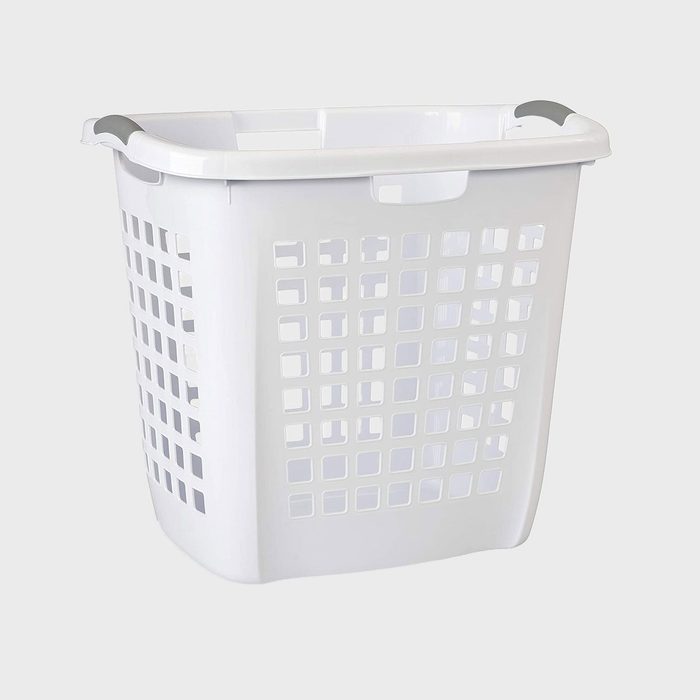 White plastic laundry basket standing; square ventilation holes, gray handles; set against a plain light gray background.