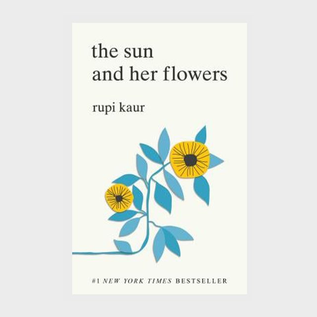 Cover features yellow flowers with blue leaves on a light background, titled 