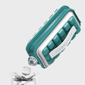 Ice tray releasing ice cubes into a glass, splashing water; the tray is turquoise with the word 