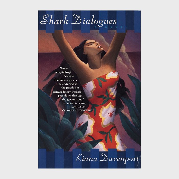 A woman stretches joyfully, wearing a floral dress amidst lush green leaves. Text: 