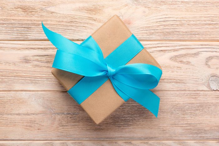 High Angle View Of Gift Box On Wooden Table