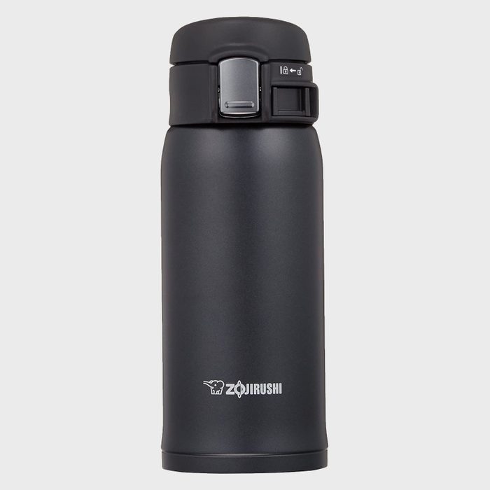 A black thermos stands upright against a plain background, featuring a lockable lid and 