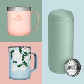 Three mugs displayed; one pink with 