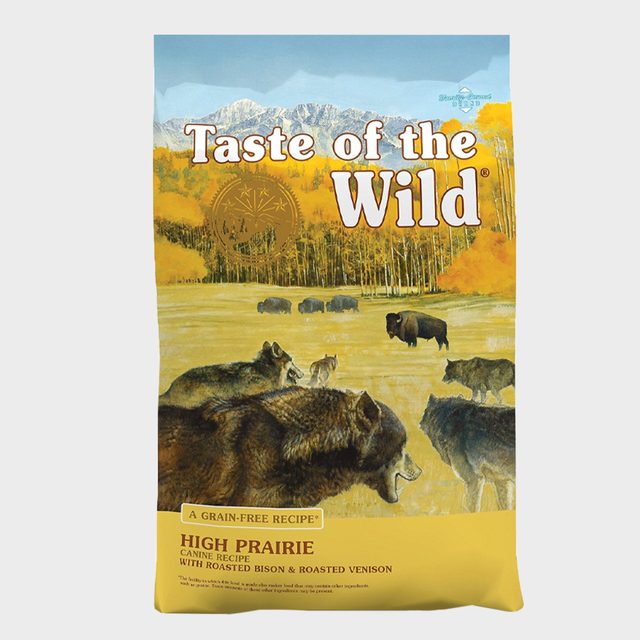 Bag depicts wolves and bison roaming a prairie with mountains; labeled 