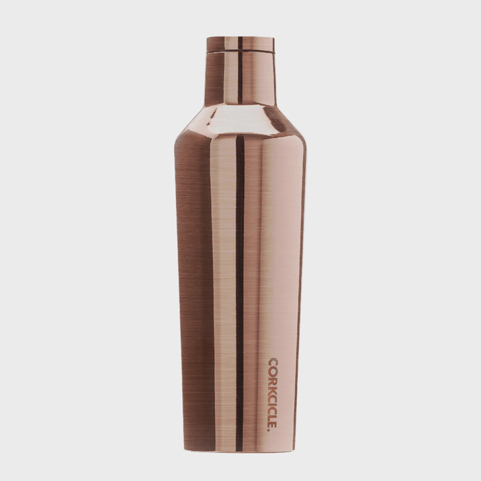 A sleek, metallic water bottle stands upright; 