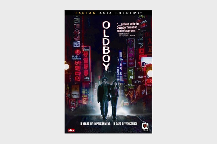 Two people walk in a neon-lit urban street; text reads "OLDBOY" and "15 Years of Imprisonment... 5 Days of Vengeance."