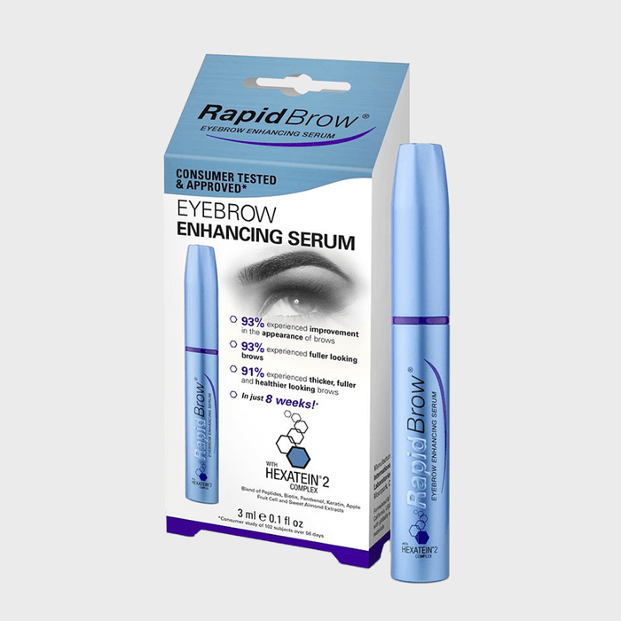 Blue bottle stands beside a box featuring eyebrow enhancing serum; claims improvement and fuller brows in 8 weeks with Hexatein-2 complex.