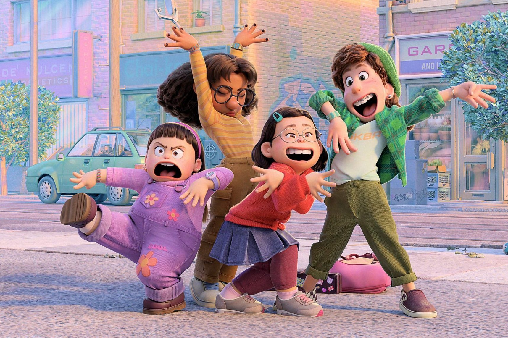 Four animated characters pose energetically on a city street, displaying expressive faces and dynamic gestures, with buildings and a car in the background.