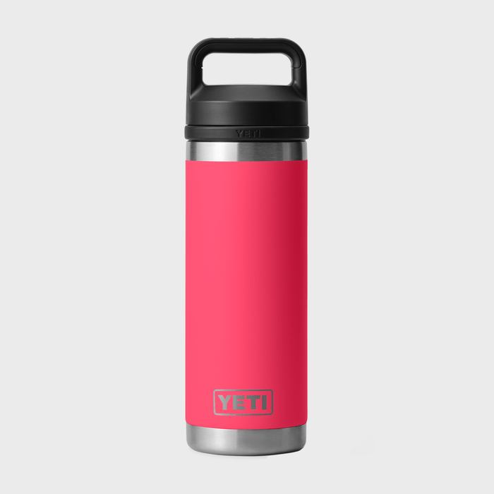 Red insulated bottle standing upright, black lid attached, against a plain gray background. 