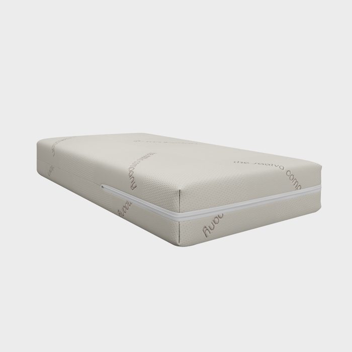 A rectangular, white mattress rests on a plain background, featuring text and a zipper around the side, providing a modern, minimalistic view.