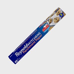 Box of Reynolds Kitchens Parchment Paper with text, cookies pictured; features a 