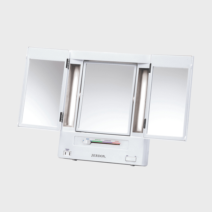 Tri-fold vanity mirror opens wide, displaying side panels; features sliding light control for day, office, evening, and home environments. Brand name 