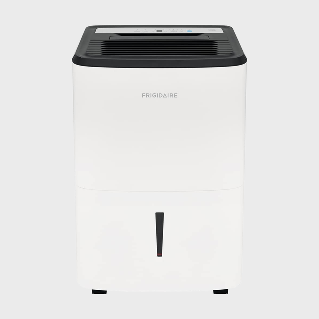 A white dehumidifier sits idle on a plain background, featuring black vents on top and the brand 