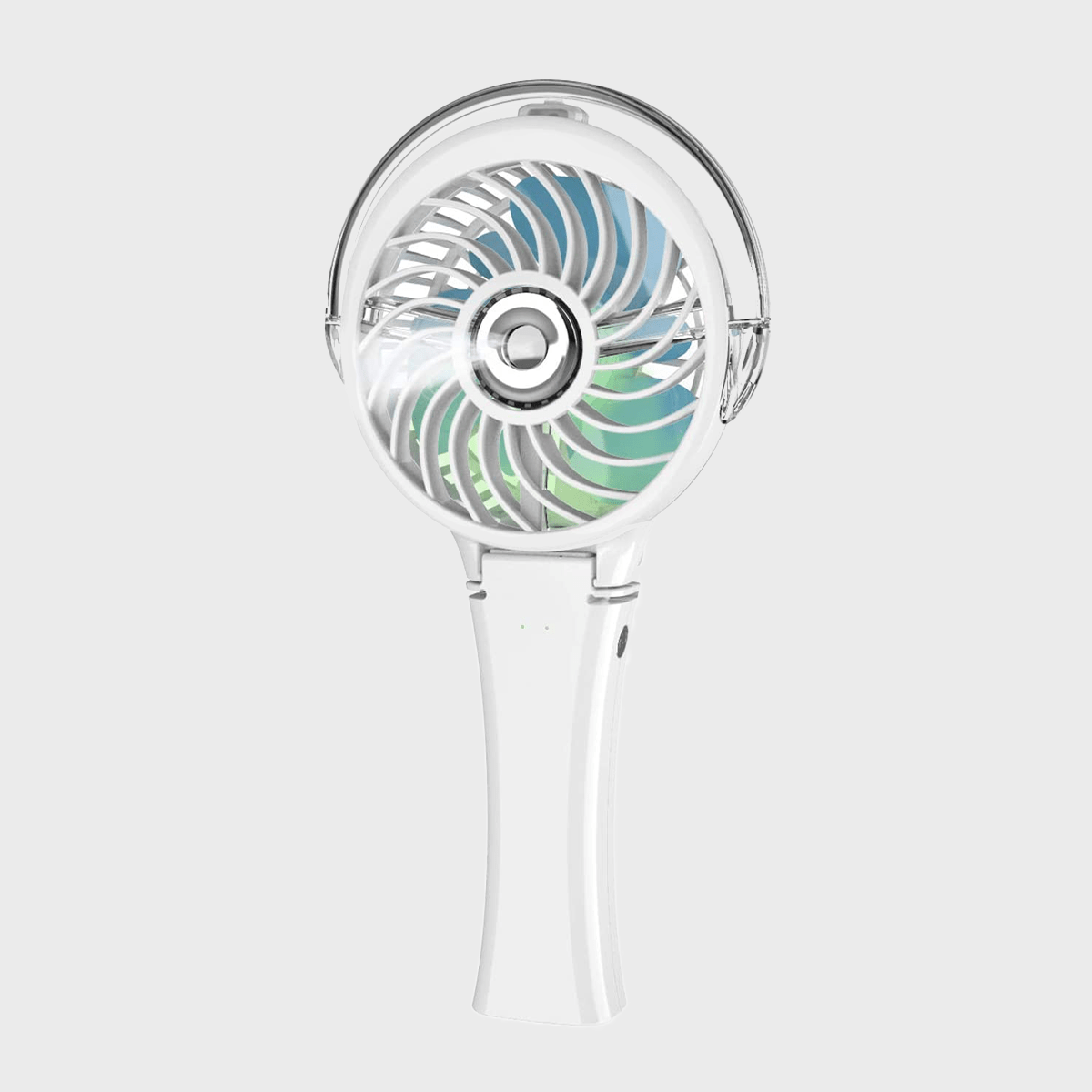 Handheld fan with rotating blades, clear casing, and a white handle, positioned against a plain gray background.