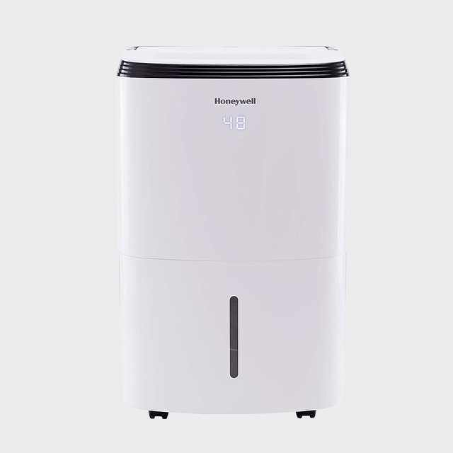 A white dehumidifier displays 