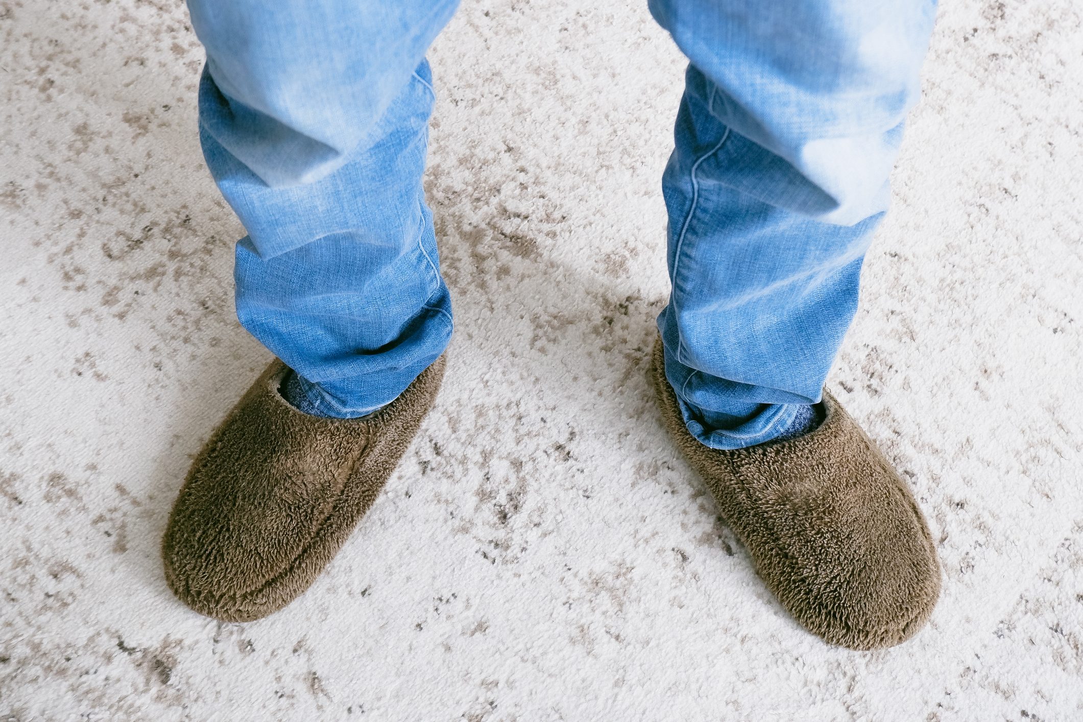 Man in Jeans and Slippers