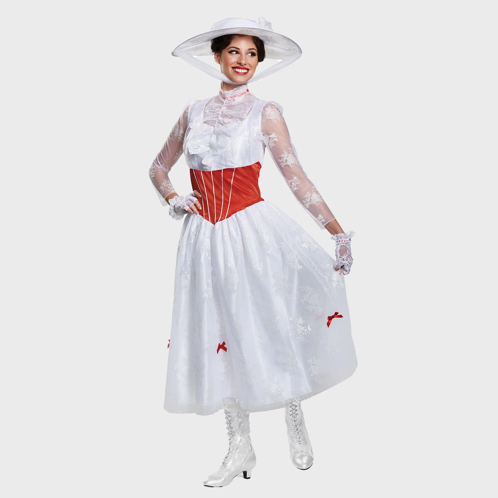 Woman wearing a vintage white dress with red accents, a wide-brimmed hat, and lace gloves, posing against a plain background.