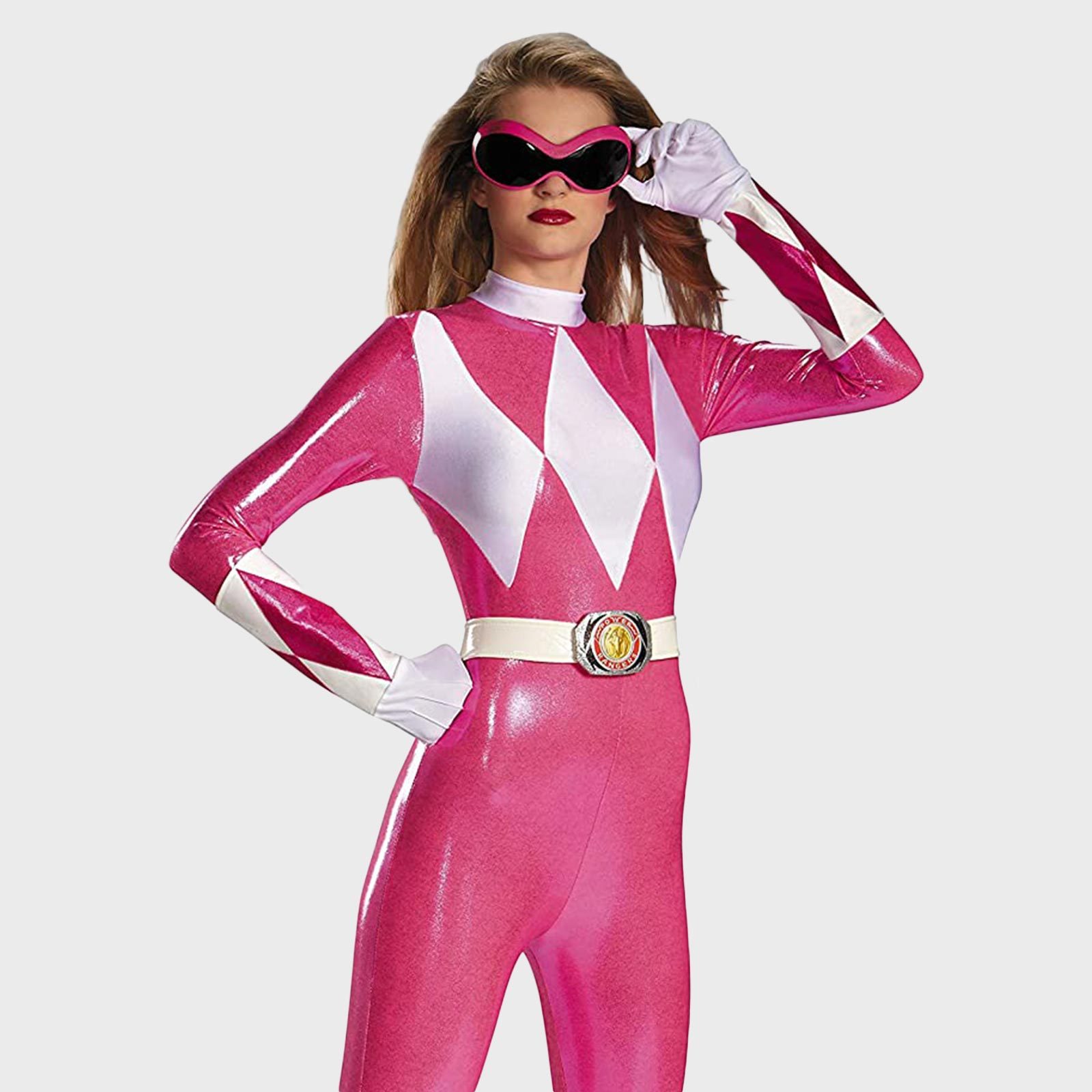 Person wearing a shiny pink superhero costume, striking a pose with one hand on hip. Background is a plain gray.