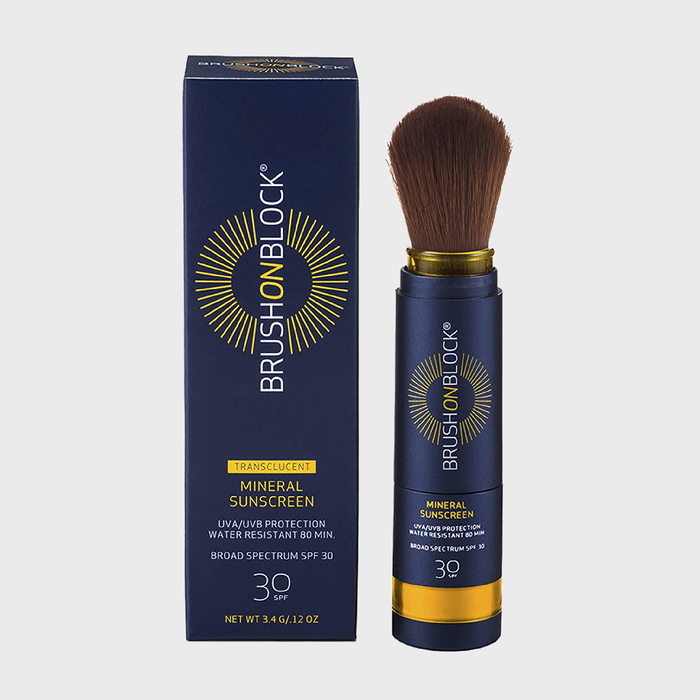 Brush dispenses translucent mineral sunscreen beside a matching box displaying product details, including SPF 30 and water resistance for 80 minutes.