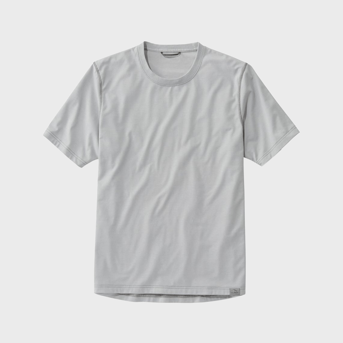 Light grey t-shirt lies flat against a plain white background, displaying short sleeves and a round neckline.