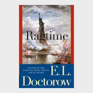 Book cover shows the Statue of Liberty beneath dramatic clouds, surrounded by historical festivities. Text reads 
