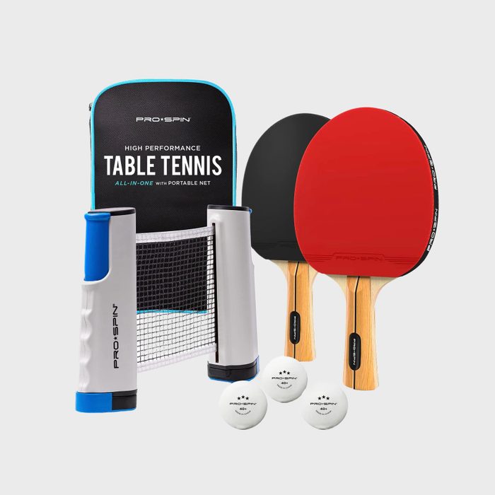 Table tennis set with two paddles, three balls, portable net, and a carrying case labeled 