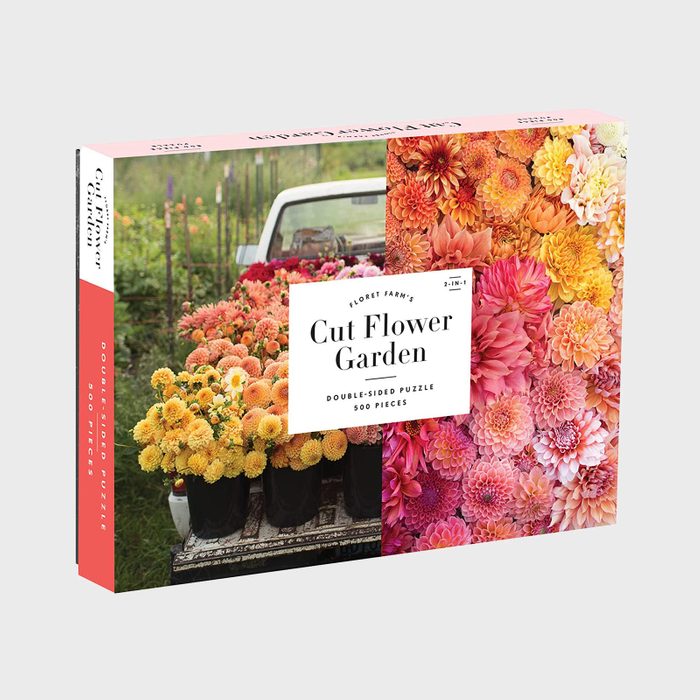 Puzzle box displays vibrant flowers in pots on a truck bed; titled 