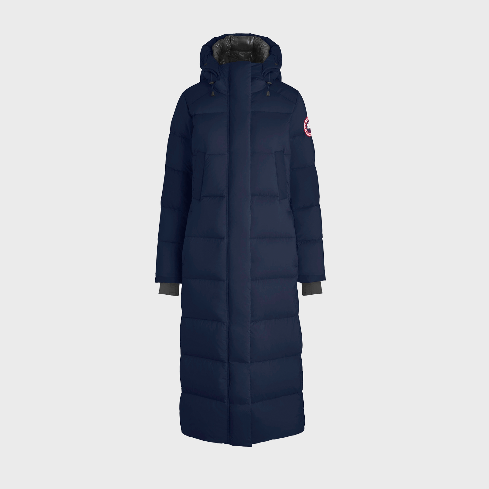 A long, navy padded coat with a hood is displayed against a plain white background.
