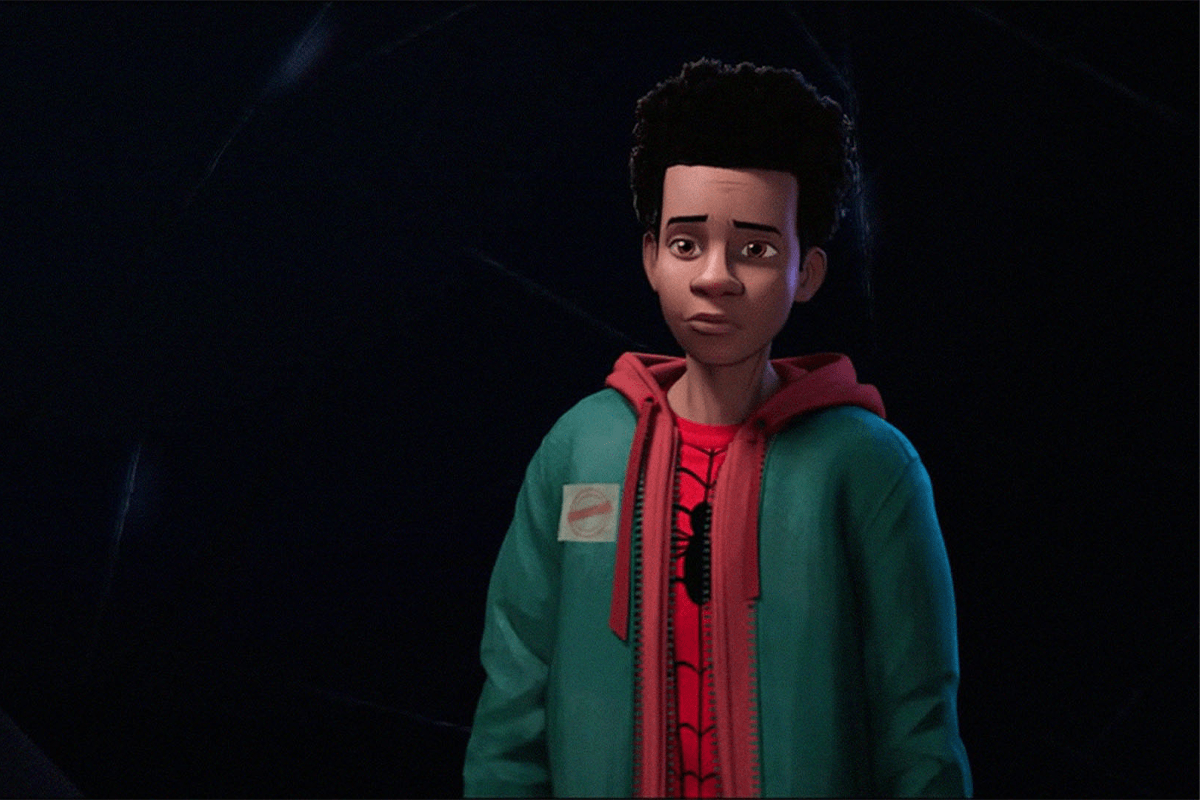 Animated character stands thoughtfully, wearing a green jacket over a red spider-themed suit, against a dark, abstract background.