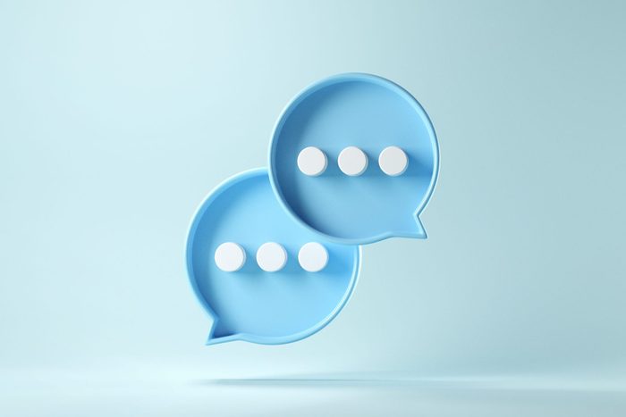 3d rendering of Two text message bubbles on a blue background
