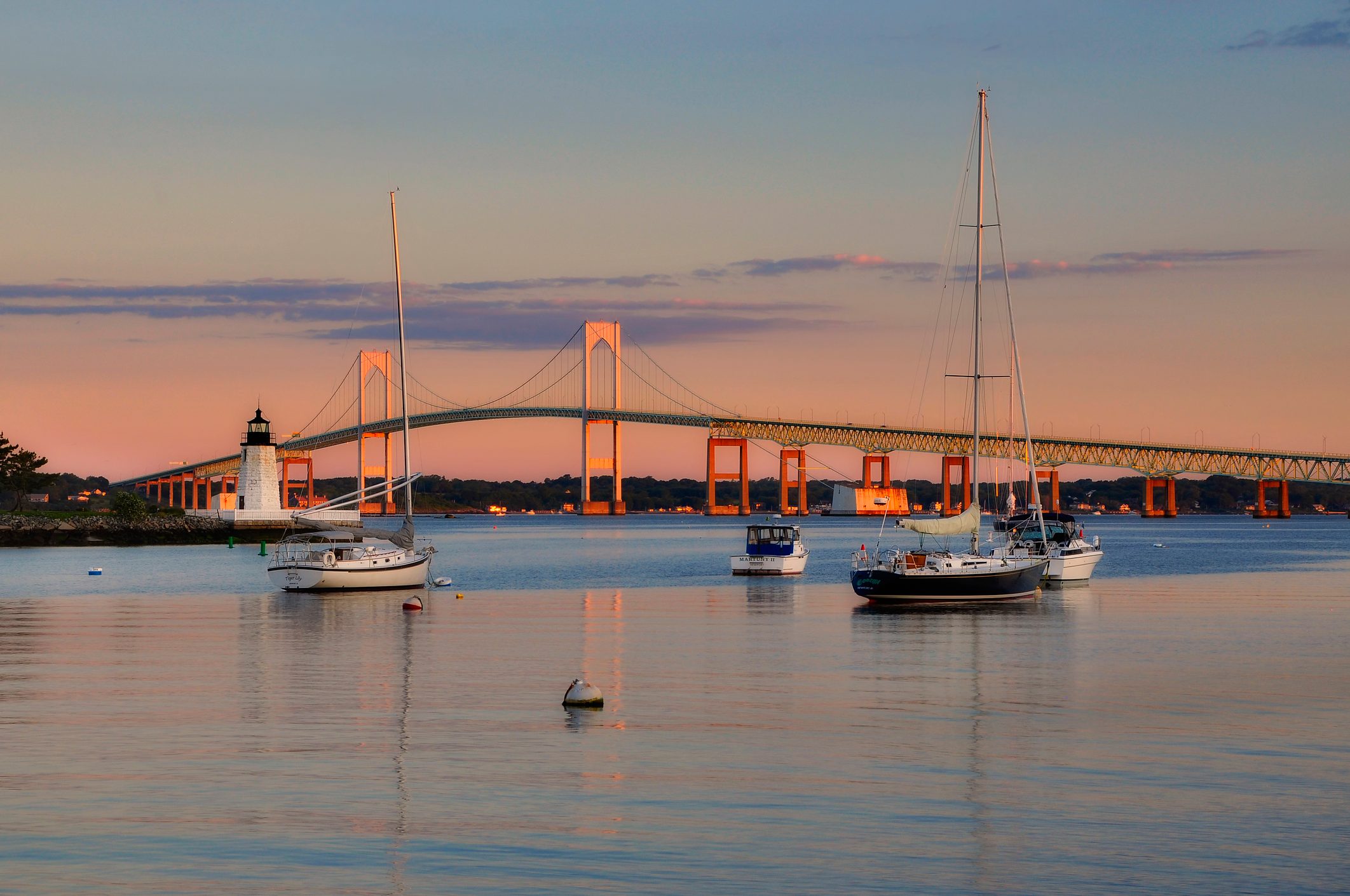Goat Island lighthouse and the Jamestown at sunrise, Newport, RI, Rhode Island
