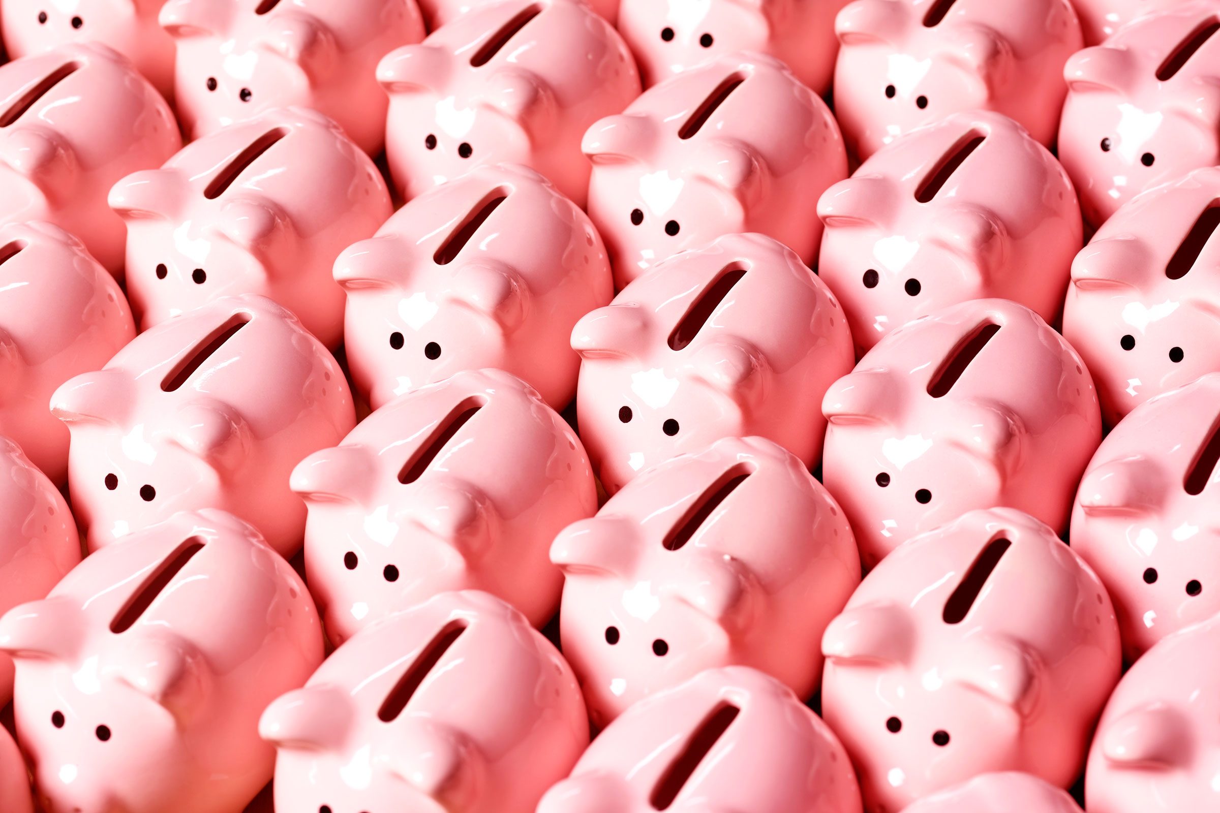 Collection of identical piggy banks, elevated view, full frame